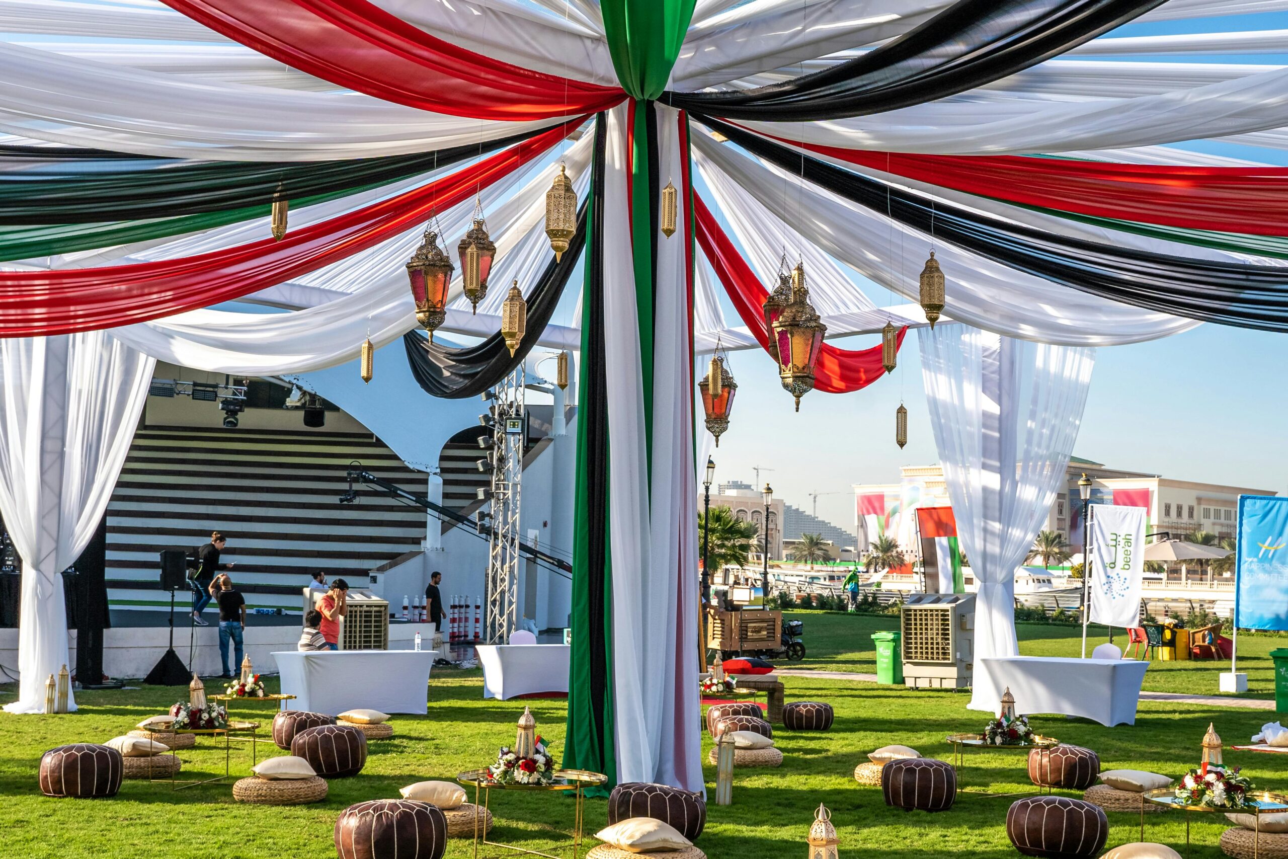 Colorful outdoor event setup with traditional Emirati decor in Dubai, ideal for cultural celebrations.